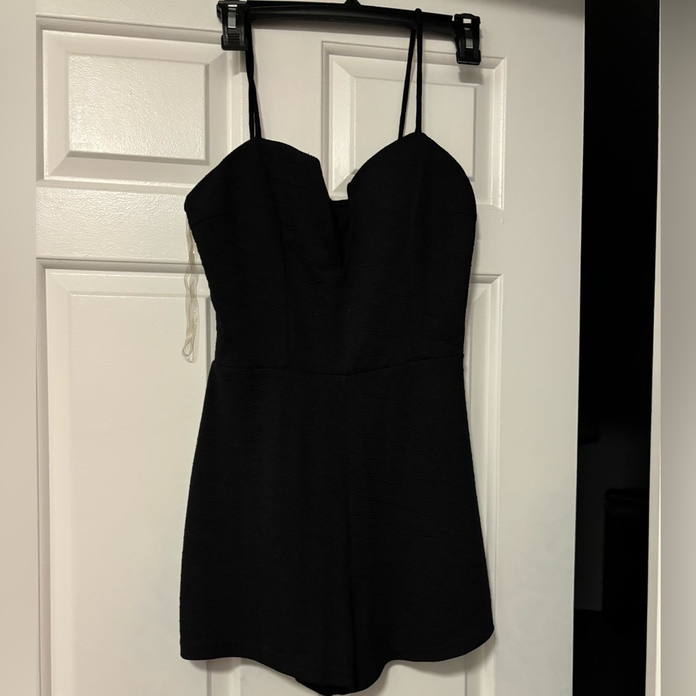 NWOT Charlotte Russe romper size medium